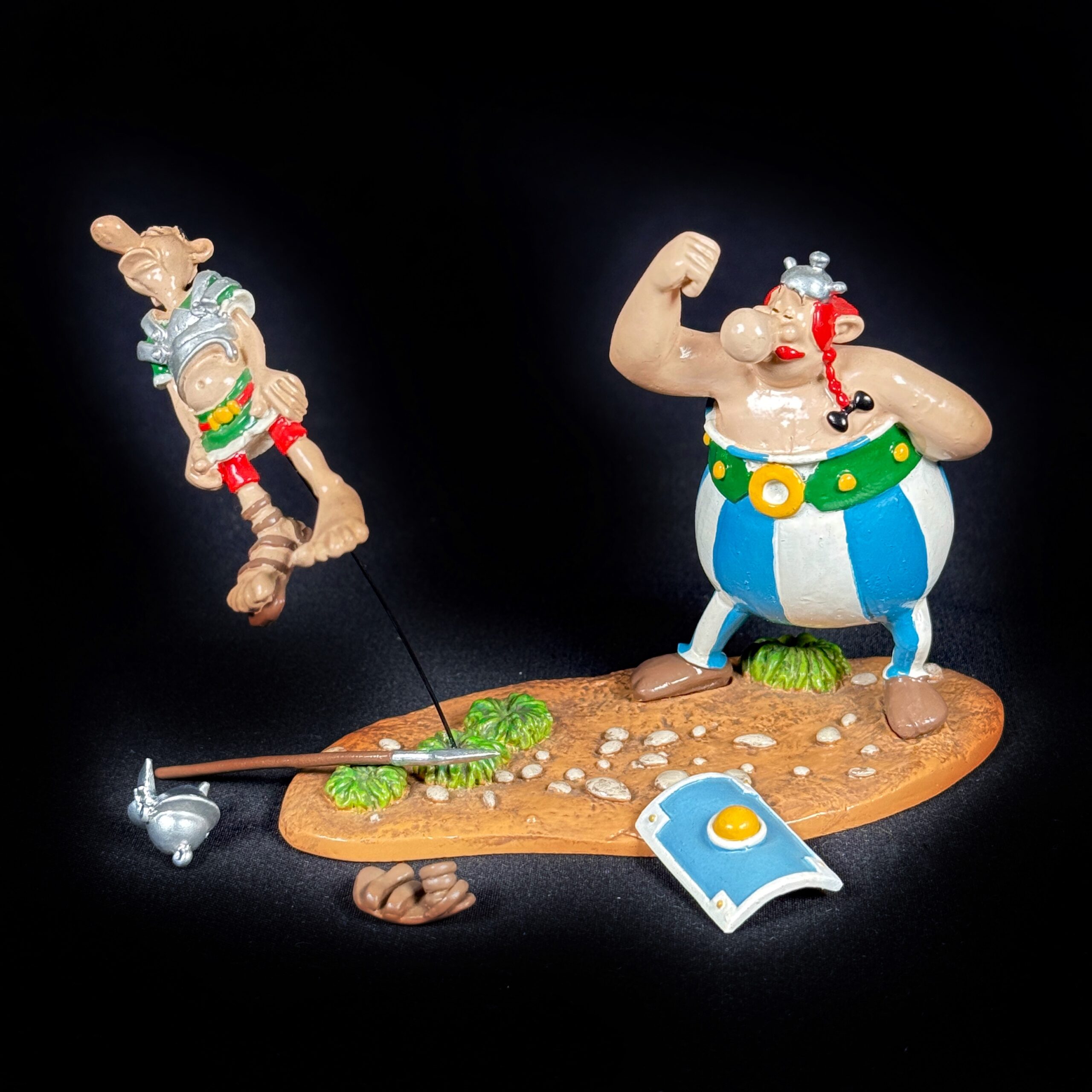 Figurine Obélix et le romain : le coup de poing pixi - Figurines Family