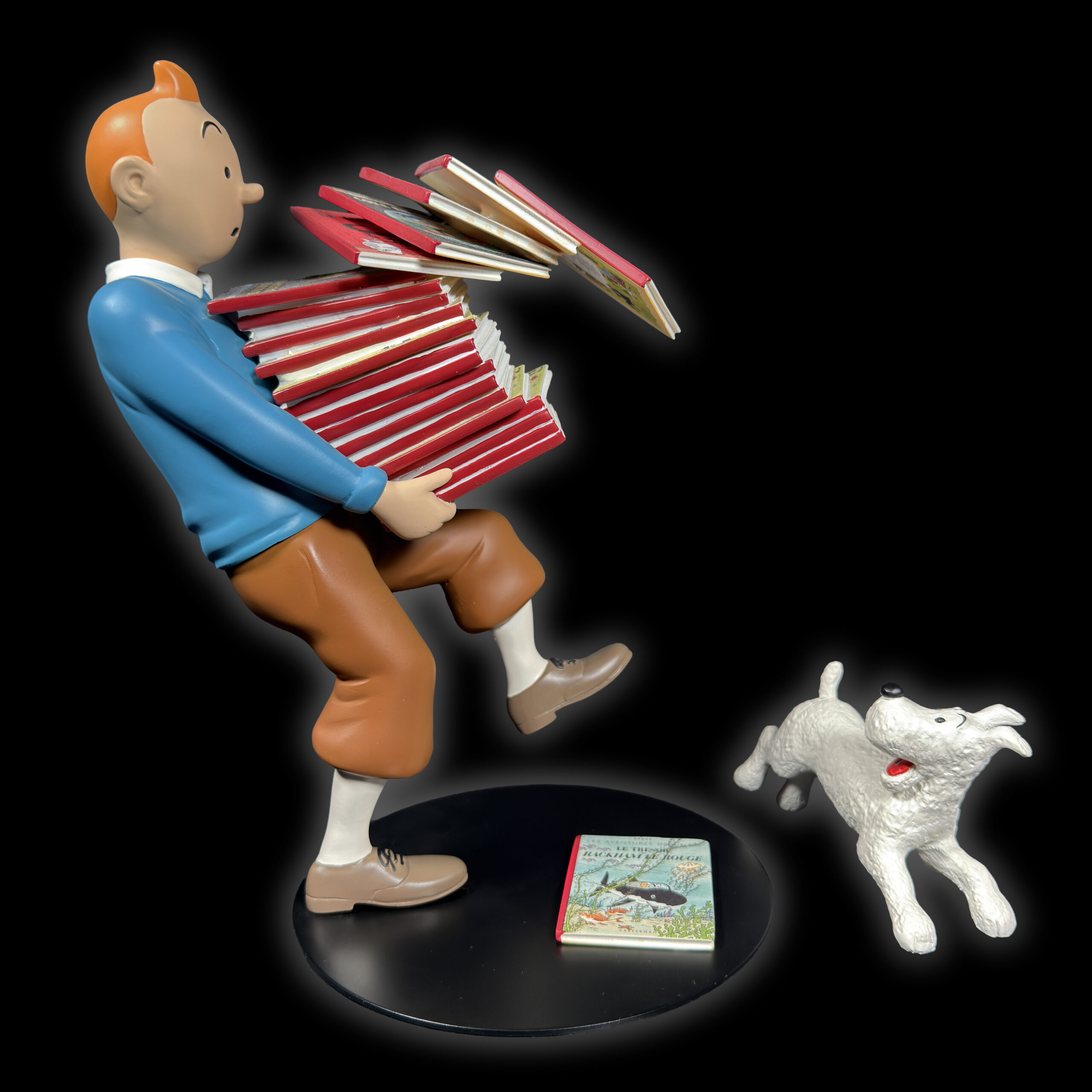 Tintin tenant les albums version 1