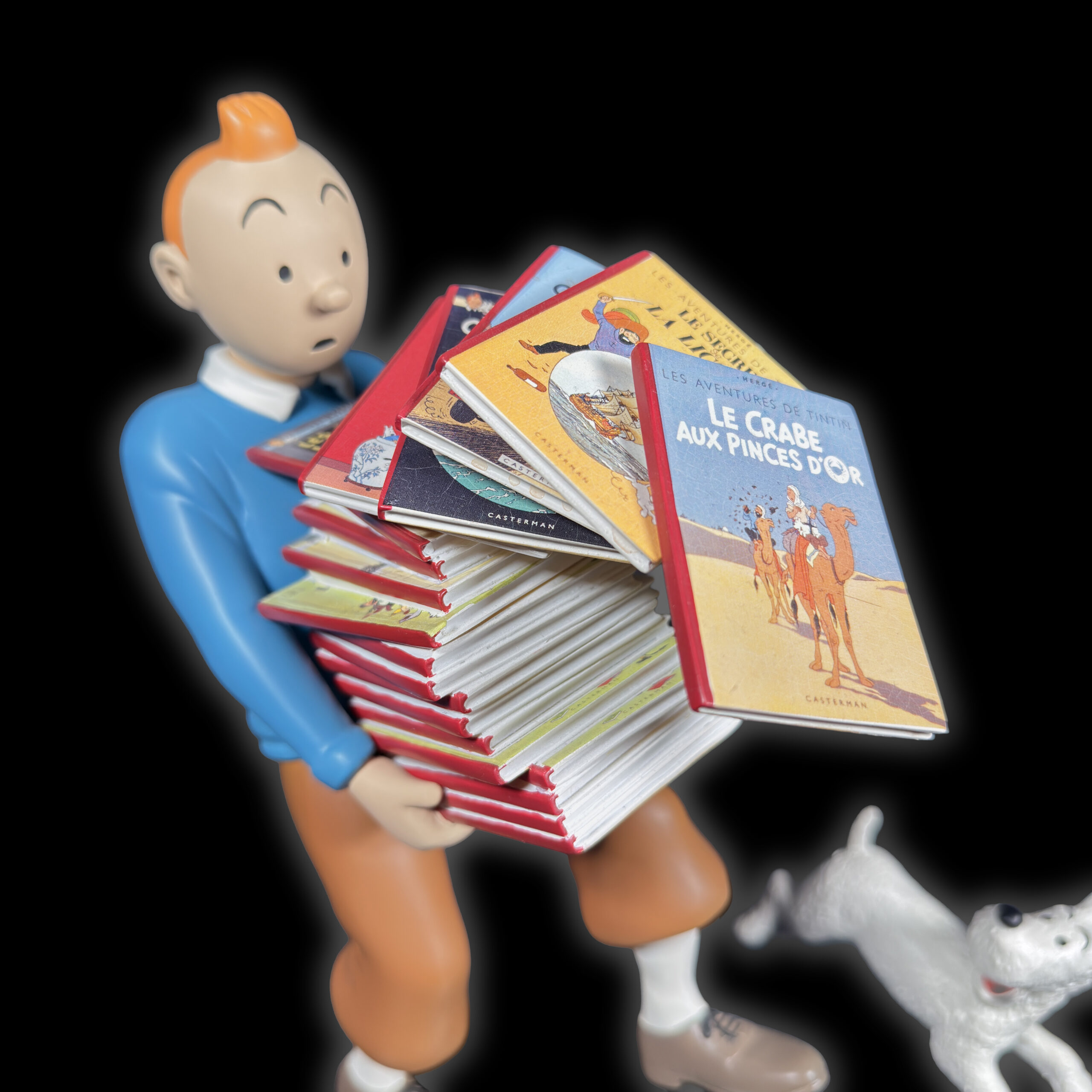 Tintin tenant les albums version 1